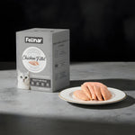 Felina Treat CAT and DOG PURE MEAT 100% Fresh Chicken Fillet in packaging with fillets on a plate.